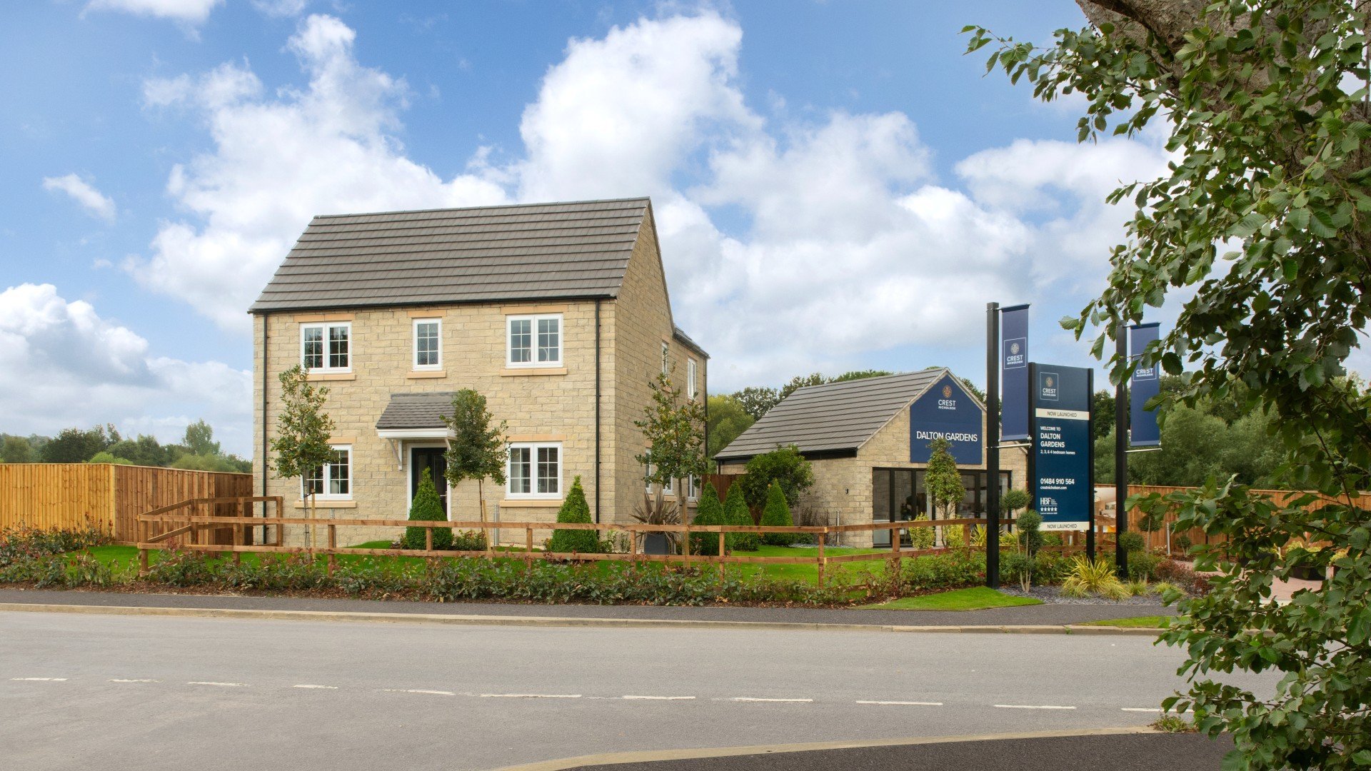 Attractive stone-built show home at Dalton Gardens in Huddersfield, set within landscaped gardens at the entrance to the development.