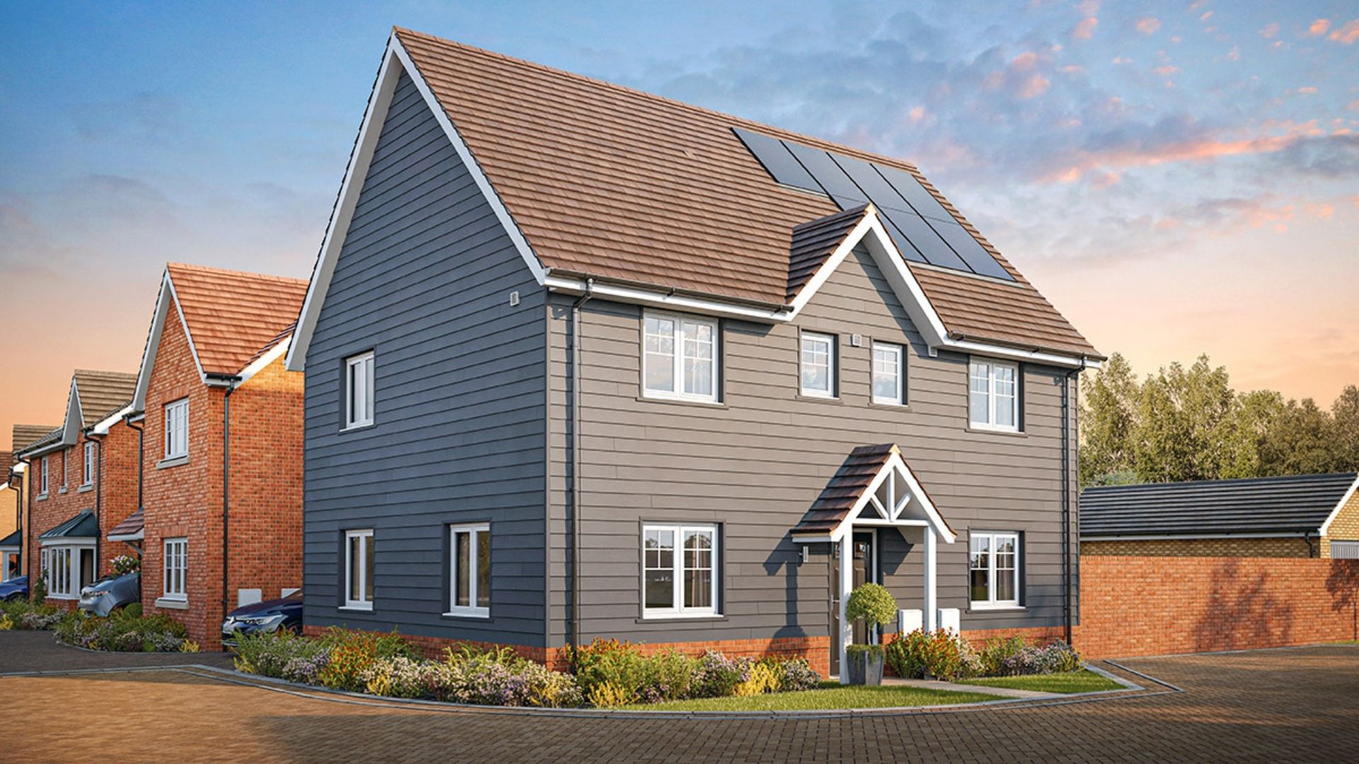 The Marlborough 3 bedroom house with black weather boarding detail and white windows. 