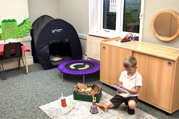 child playing in new sensory room