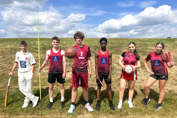 Sports team members showing new Crest Nicholson sponsored kits