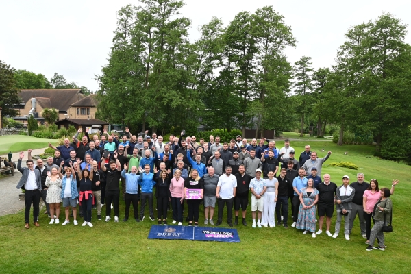 group shot of people on golf course