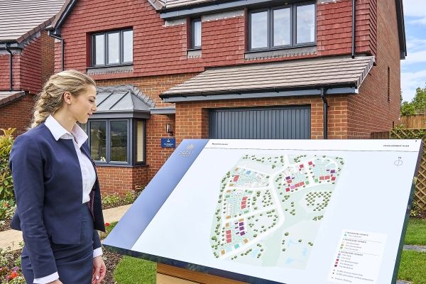 Sales team member looking at development board